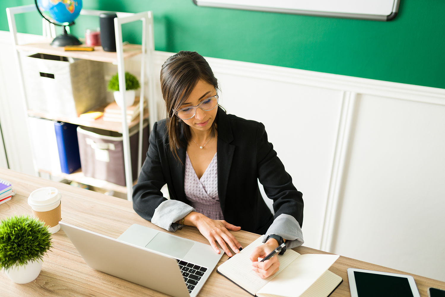 working-from-home-formal-young-teacher-writing-notebook-planning-her-class-home